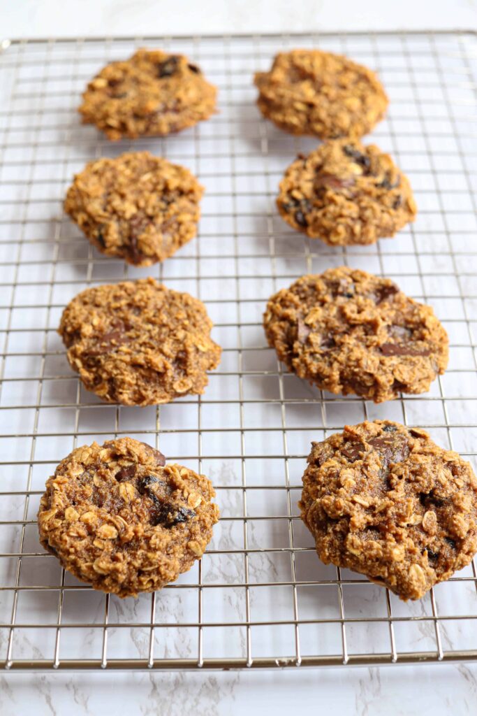 healthy no butter oatmeal cookies on a cooling rack.