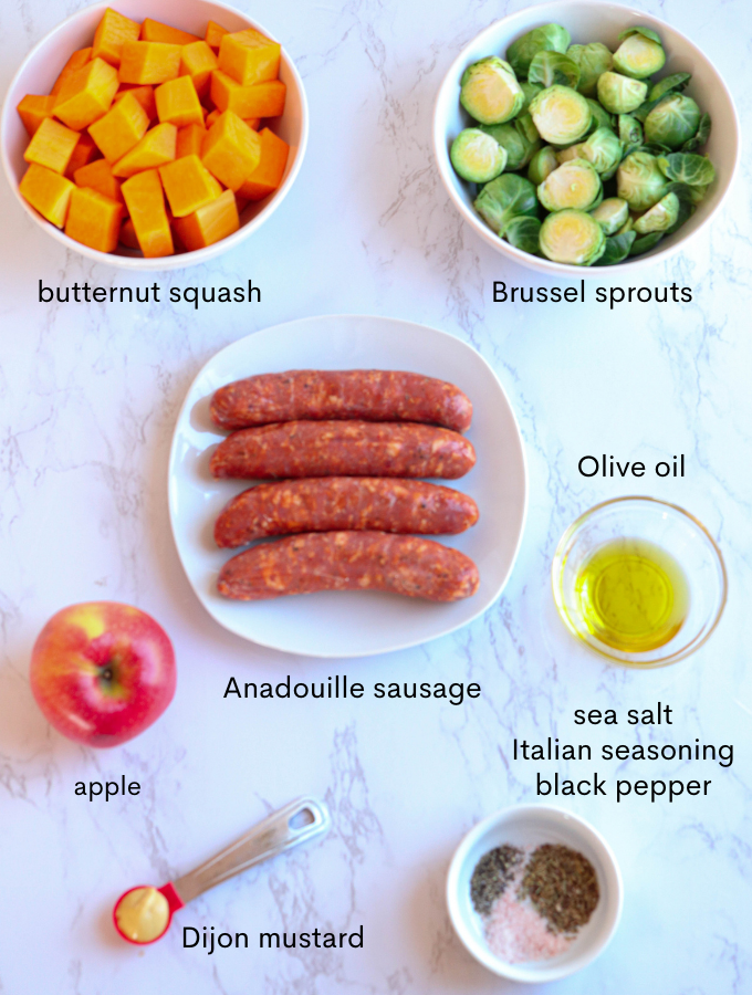sausage, oil, brussels sprouts, butternut squash, apple and spices with captions