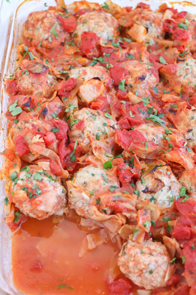 unstuffed cabbage rolls meatballs in a glass pyrex dish