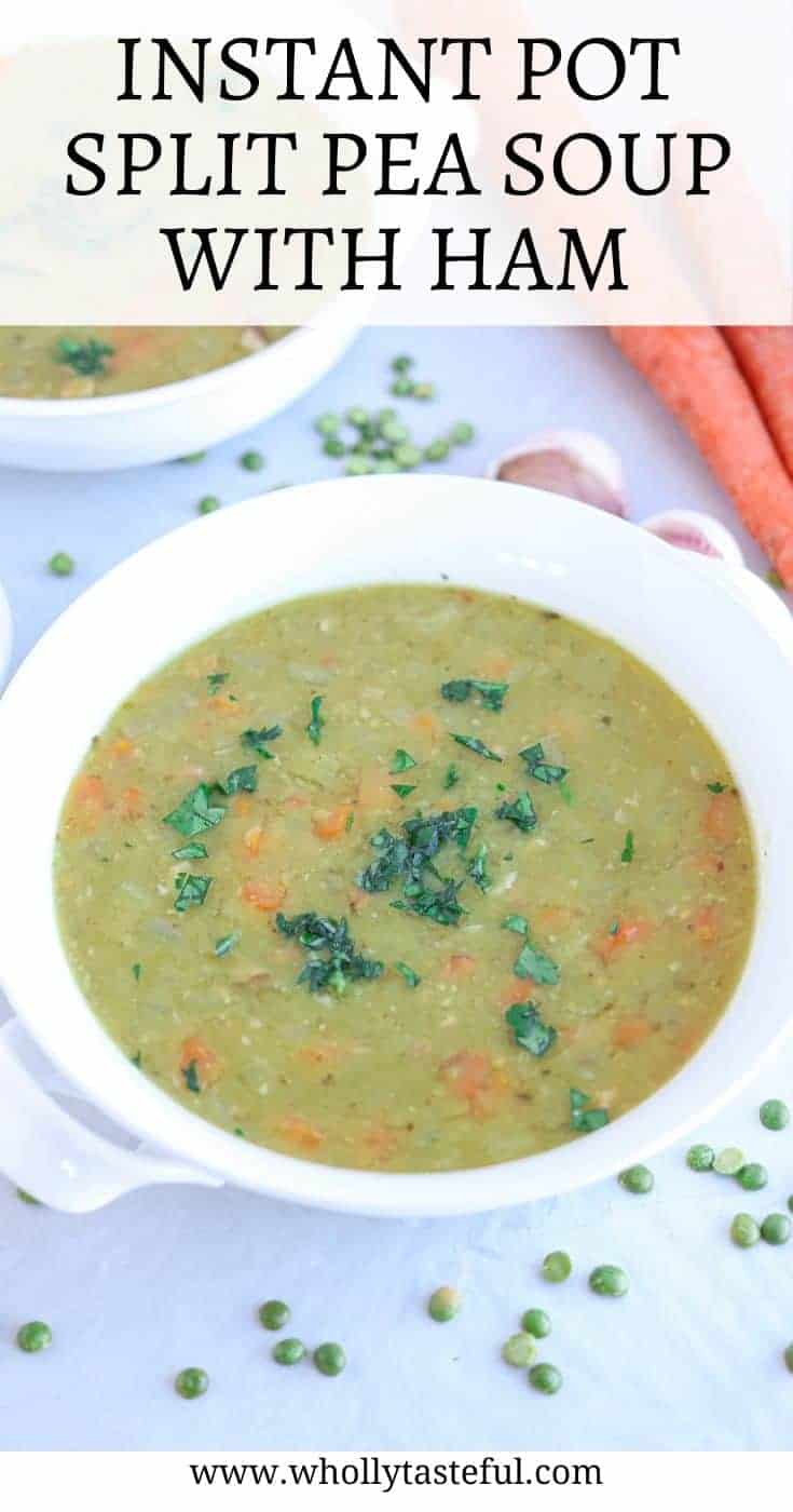 a white bowl of split pea and ham soup on gray surface with garlic cloves, split peas and carrots around with title on top for Pinterest