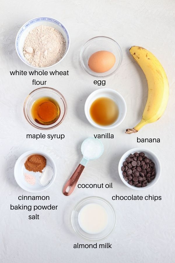 ingredients for making banana mug cake with captions.