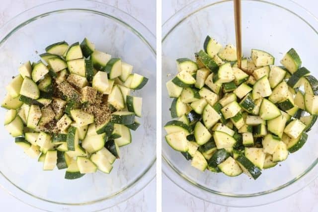 chopped zucchini in a glass bowl with oil and spices