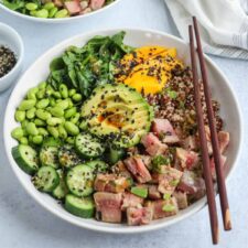 quinoa poke bowl with ahi tuna, edamame and avocado