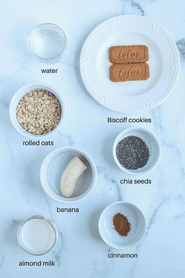 biscoff oatmeal ingredients on white marble surface.