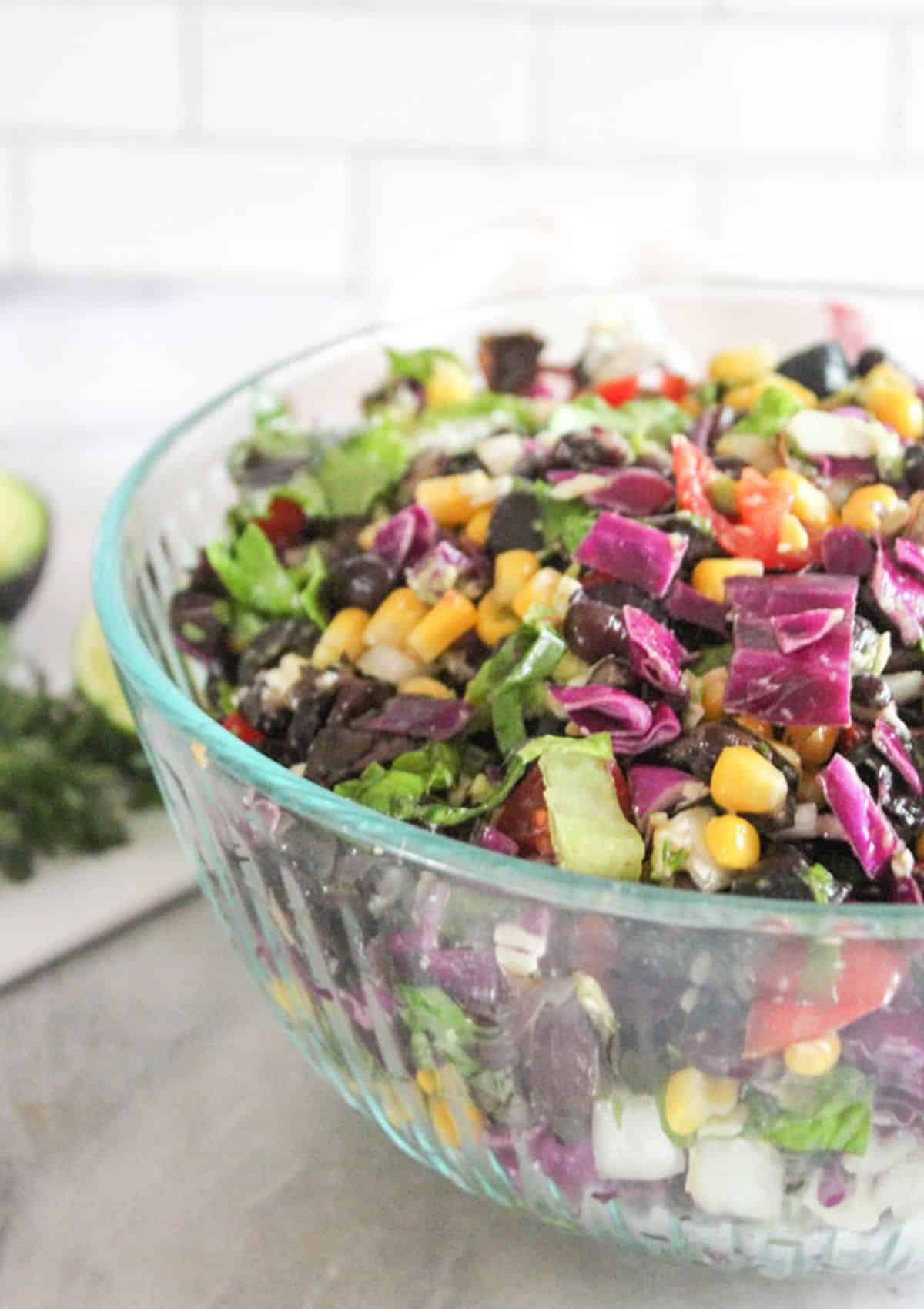 Mexican chopped salad in a glass bowl.