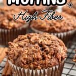 Close-up of healthy morning glory muffins on a cooling rack with text overlay: Healthy Morning Glory Muffins, High Fiber. These delicious healthy morning glory muffins are perfect for breakfast. The website whollytasteful.com appears at the bottom.