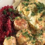 Polish chicken meatballs in creamy dill sauce served with mashed potatoes and shredded red beets.
